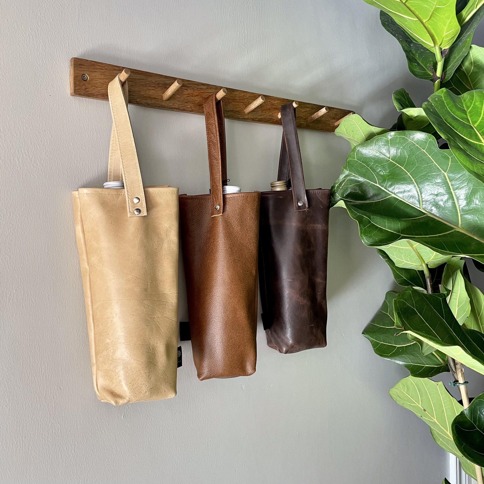 Leather wine bag in light medium and dark brown leather