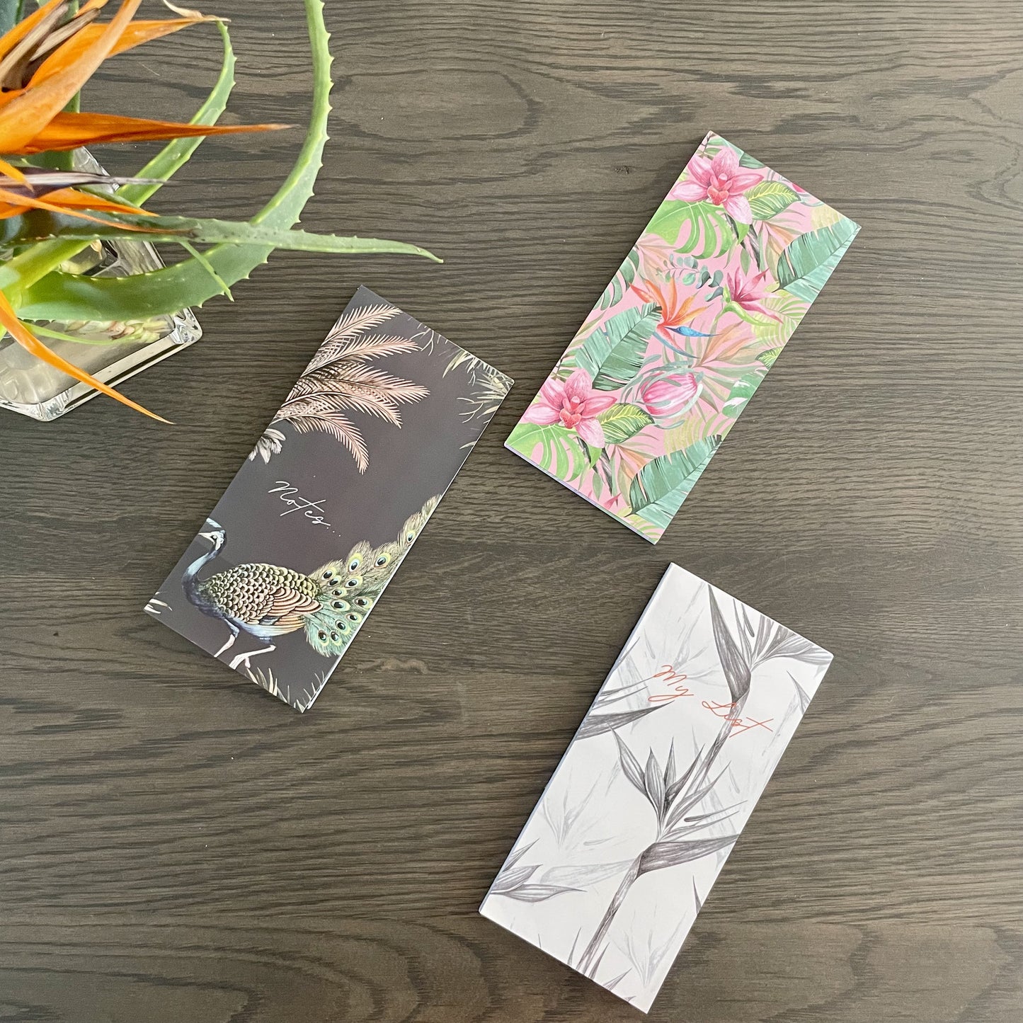Three different notebooks with magnetic back