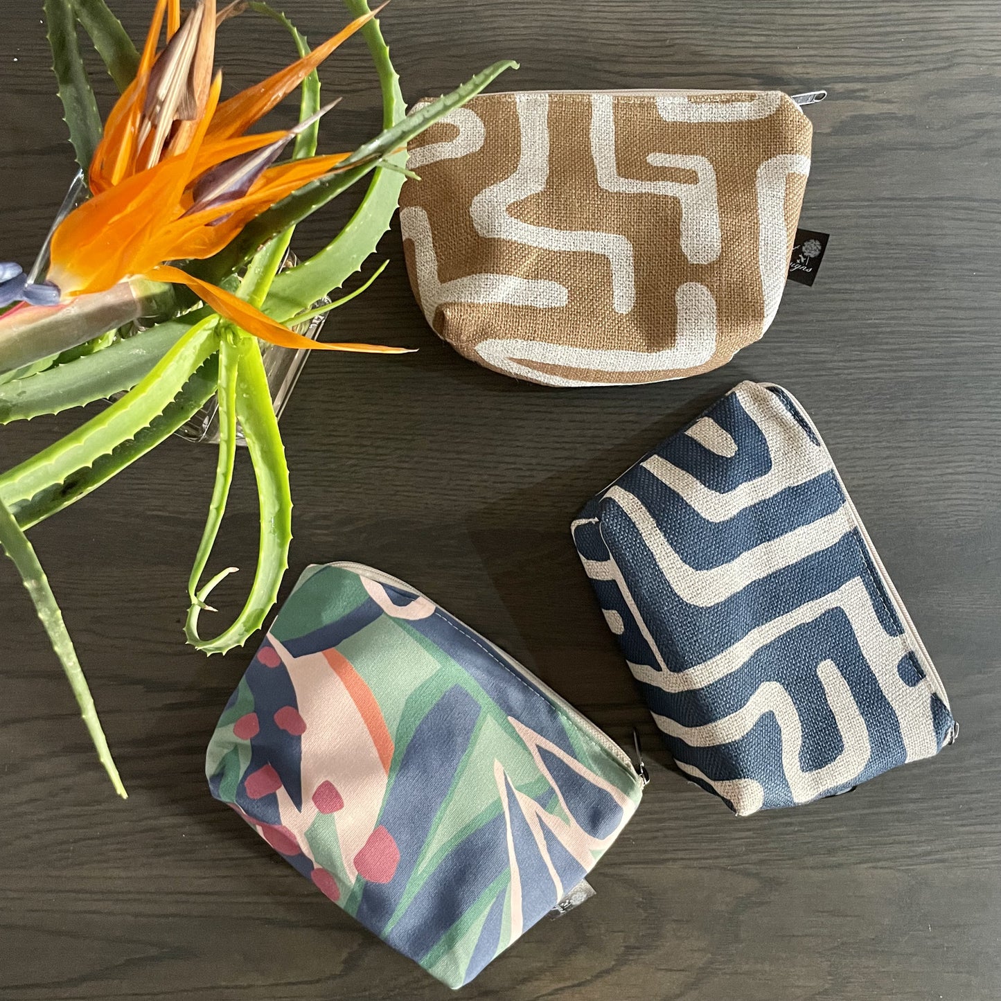 Toiletry bags in Nola Desert, Nola Tranquil and La Serano Fabric