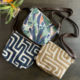Fabric and Leather Sling Handbags