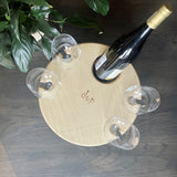 Top view of picnic table with wine and 4 glasses