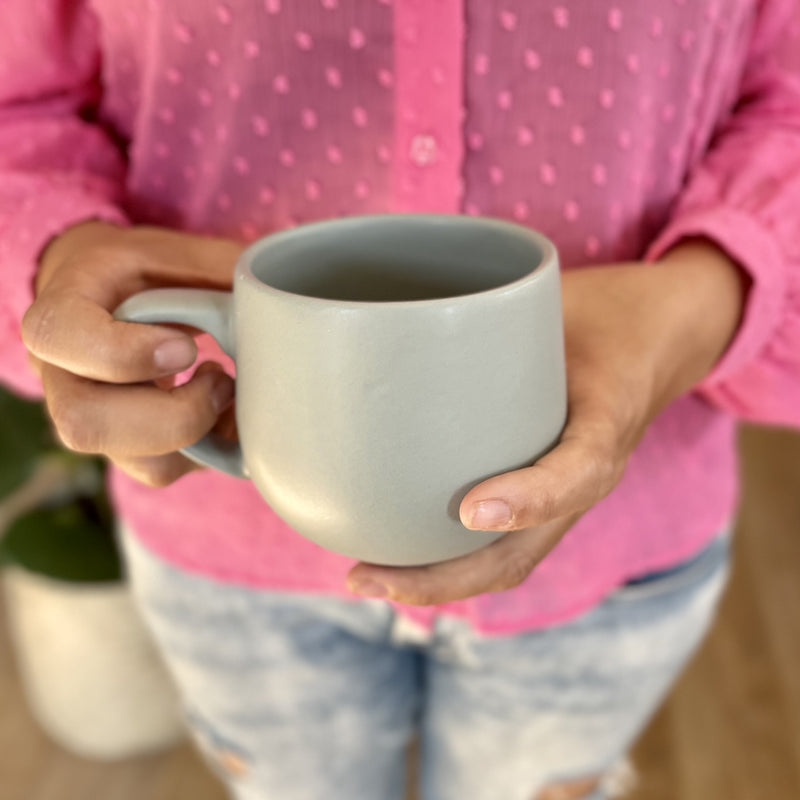 A generous grey coffee or tea mug