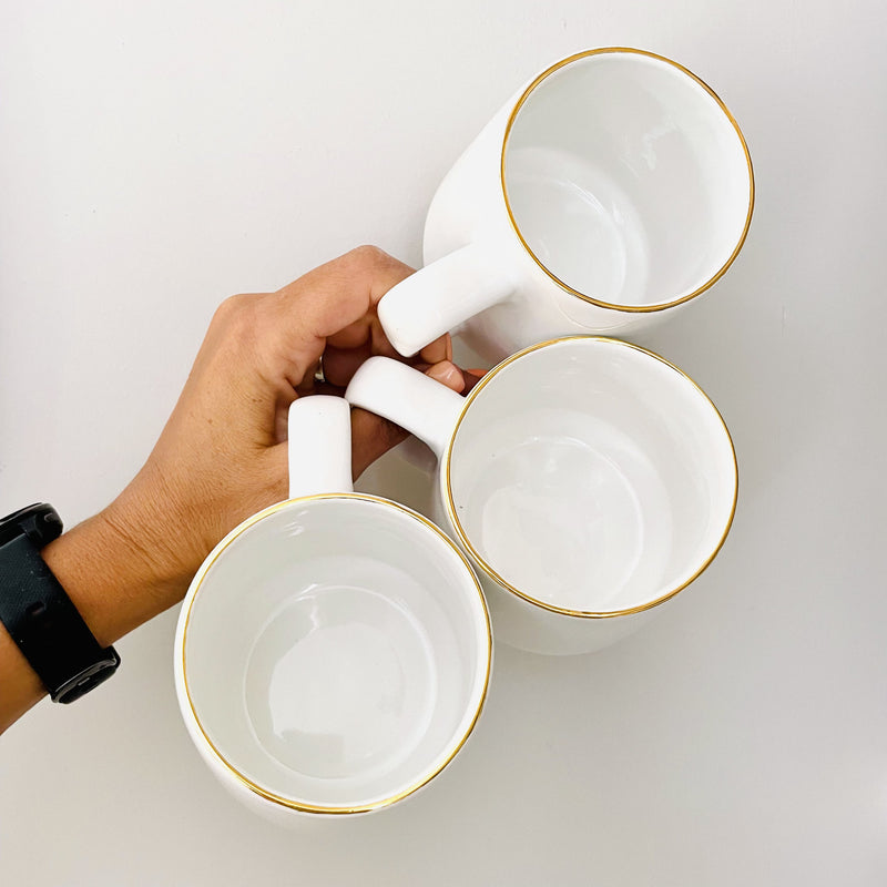 Three Gloss White Mugs with Gold Rims