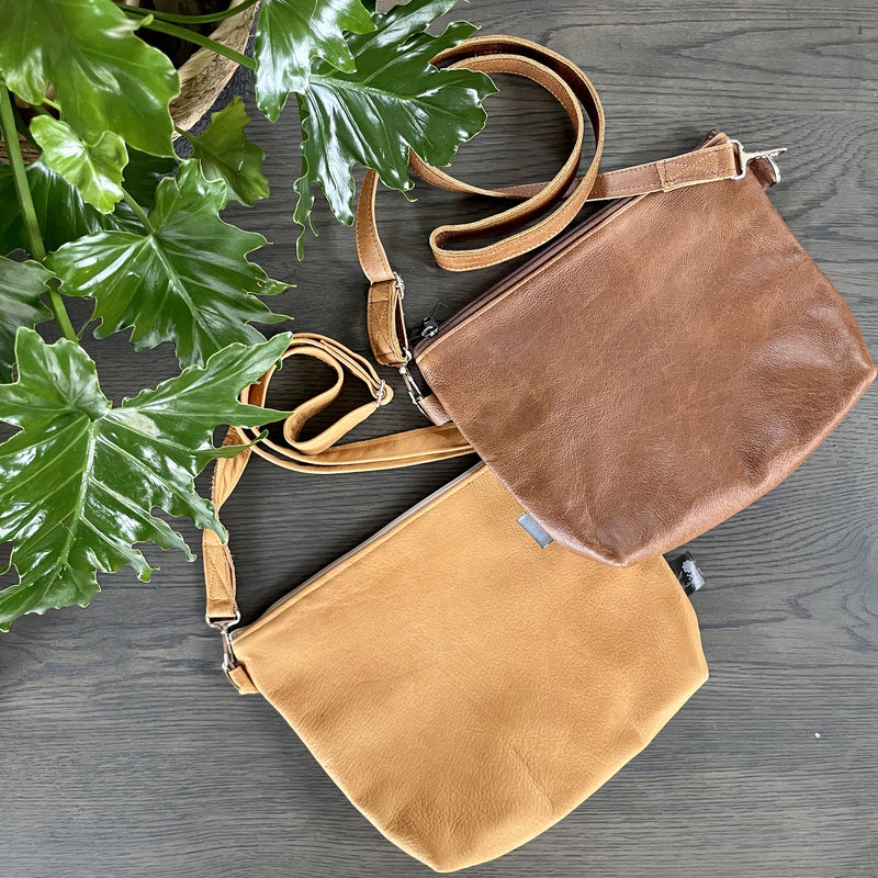 Stowe bag in toffee and pumpkin leather with adjustable sling
