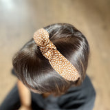 Speckle Silk Knot Alice Band - Caramel on head