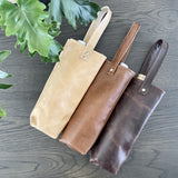 Single wine bag in tan, toffee and chocolate leather